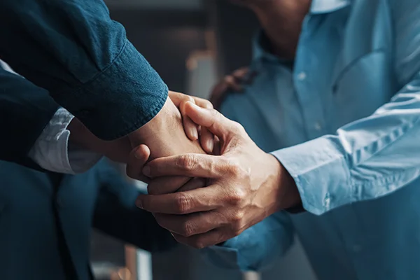 Good men do nothing: two men shaking hands